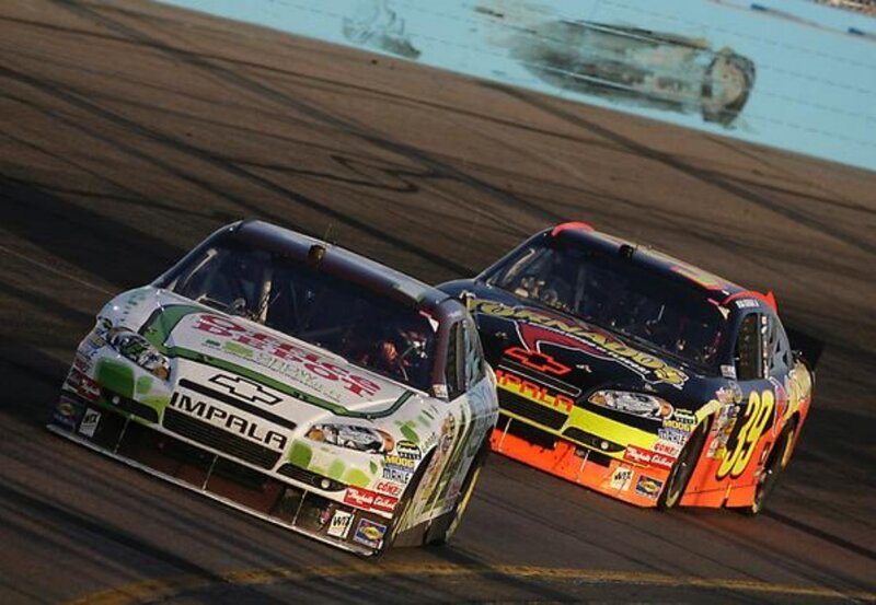 NASCAR race cars on track