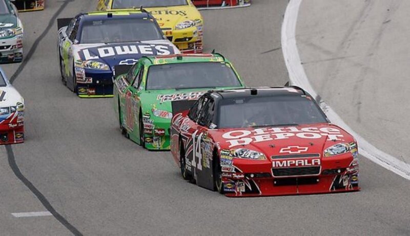 NASCAR race cars on track