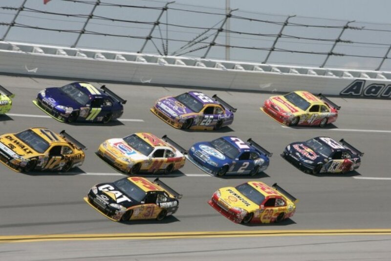 NASCAR race cars on track