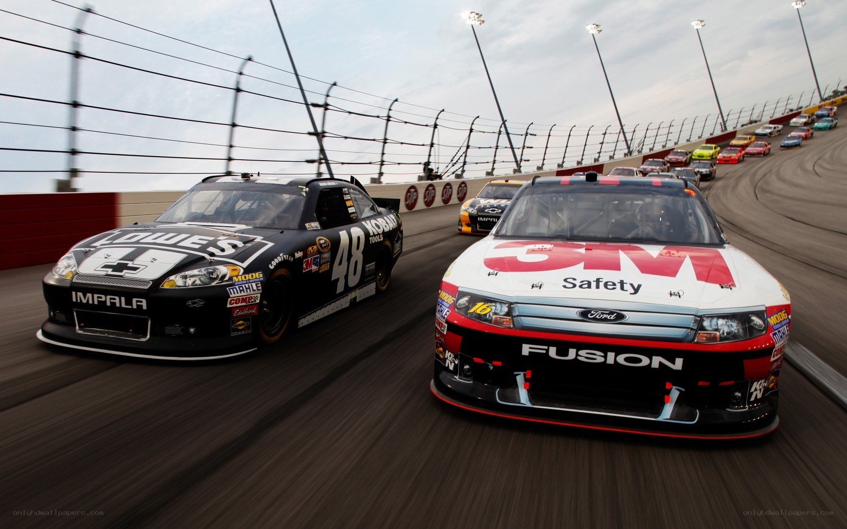 NASCAR race cars on track