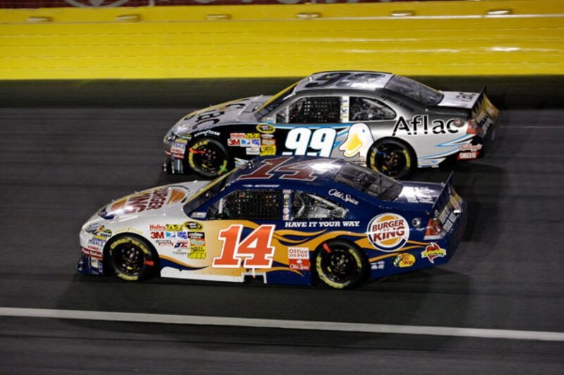 NASCAR race cars on track