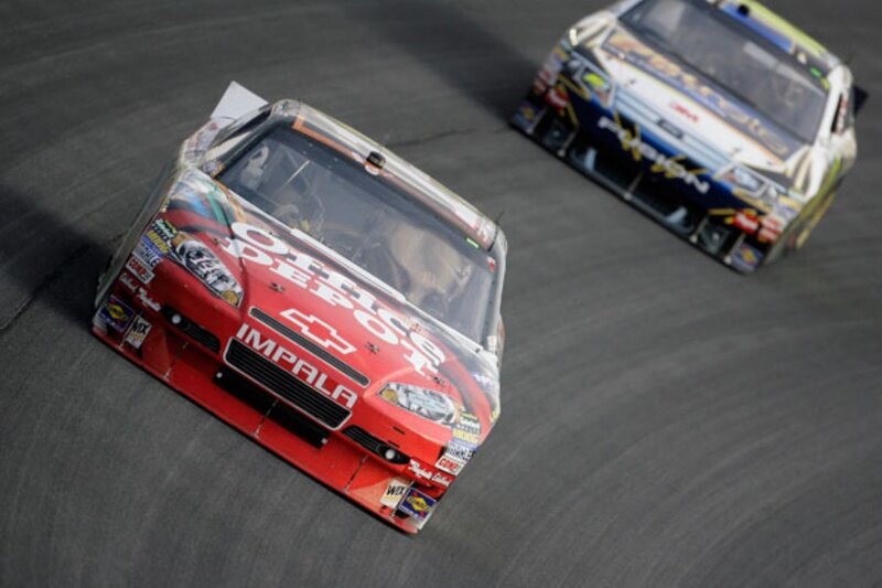 NASCAR race cars on track