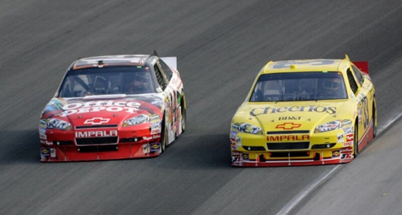 NASCAR race cars on track