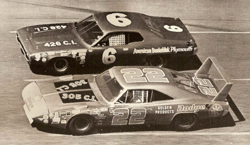 NASCAR race cars on track