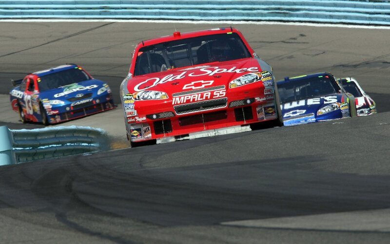 NASCAR race cars on track
