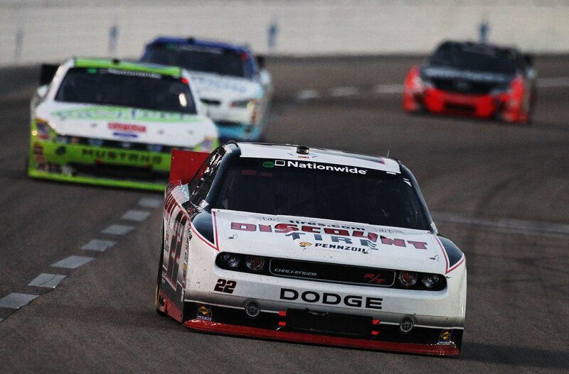 NASCAR race cars on track