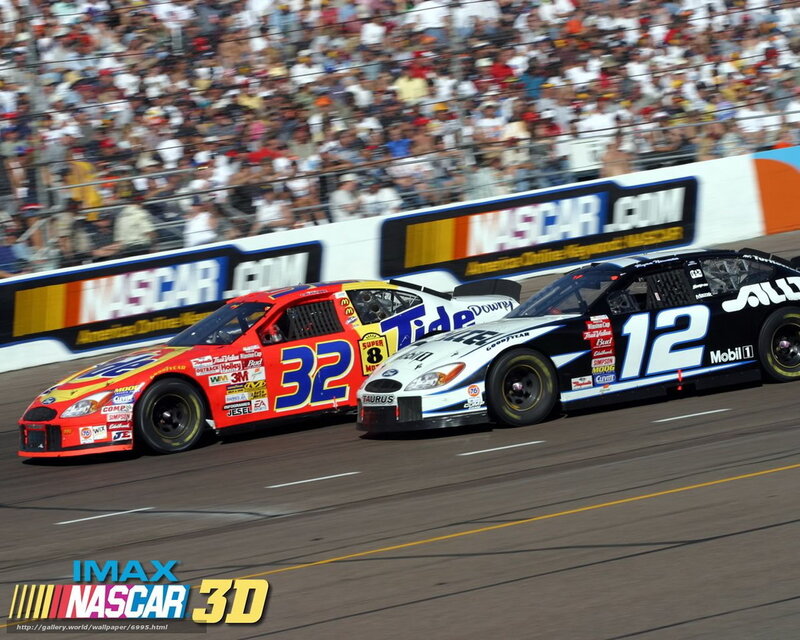 NASCAR race cars on track