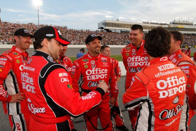 NASCAR team celebrating on track