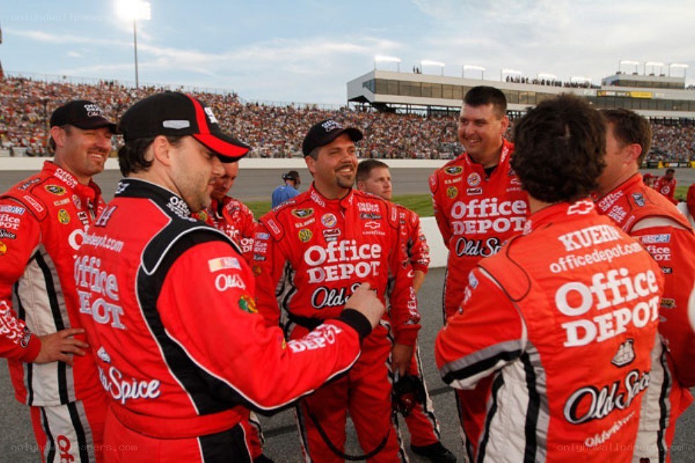 NASCAR team celebrating on track