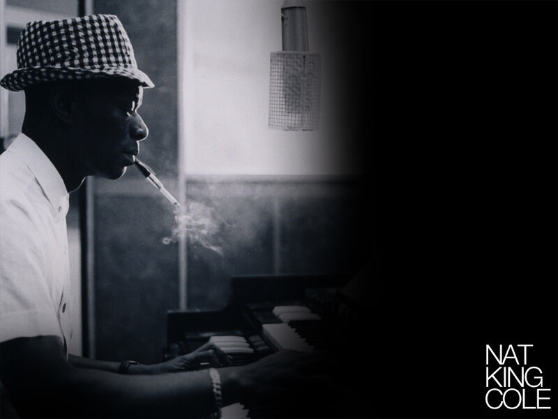 Nat King Cole playing piano