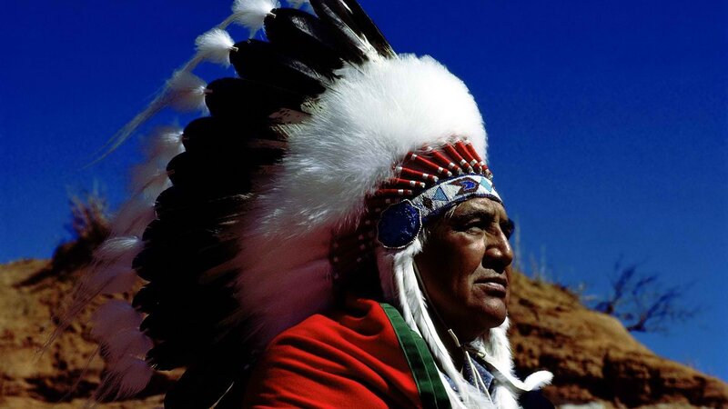 Native American chief in feather headdress