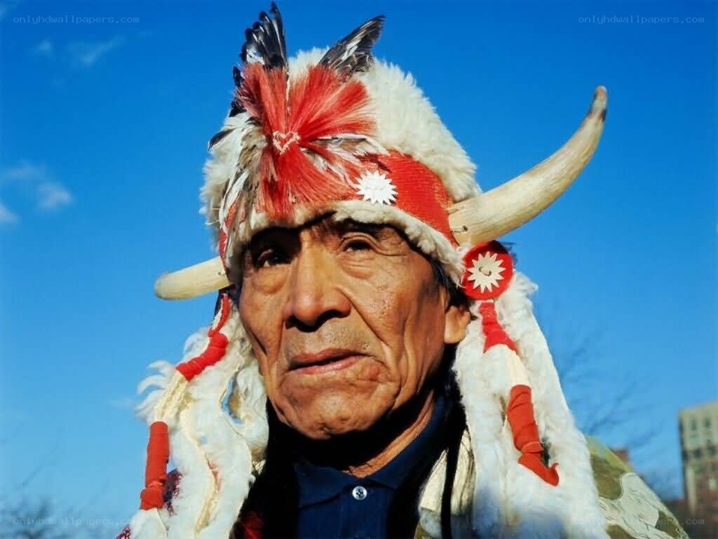 Native American elder in traditional headdress