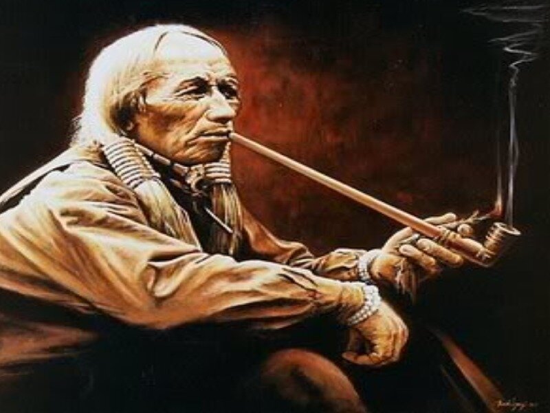 Native American elder smoking pipe