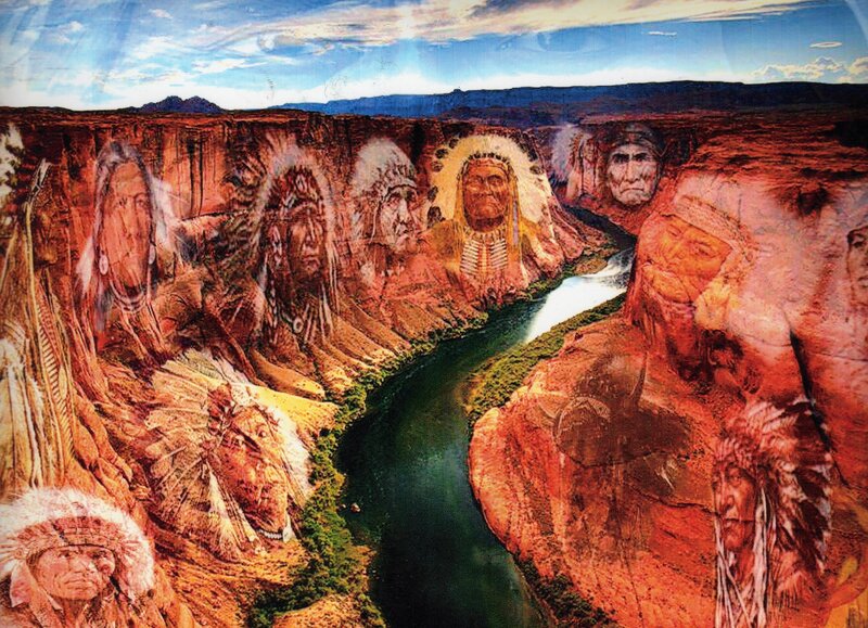 Native American faces in canyon
