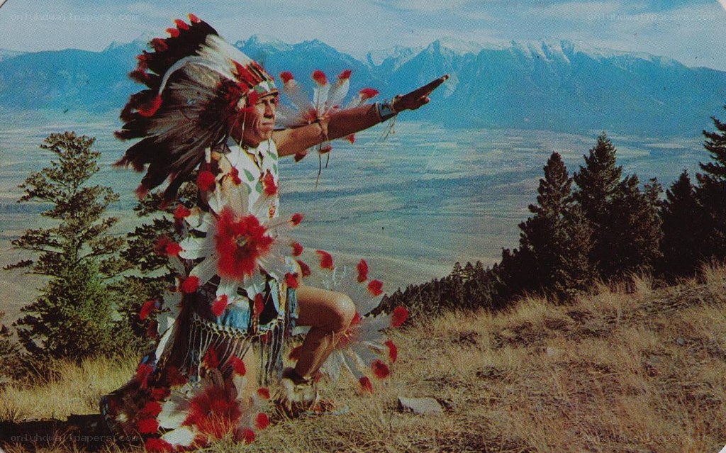 Native American man in traditional regalia