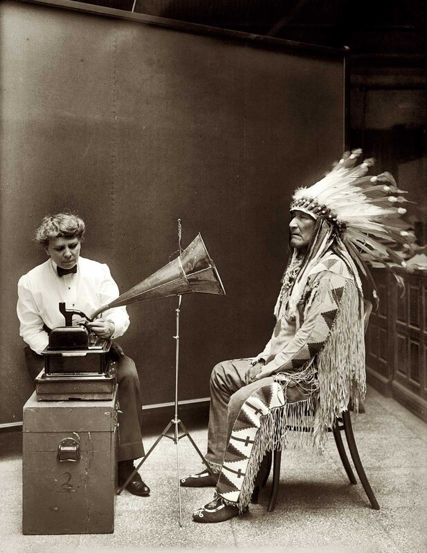 Native American man with phonograph