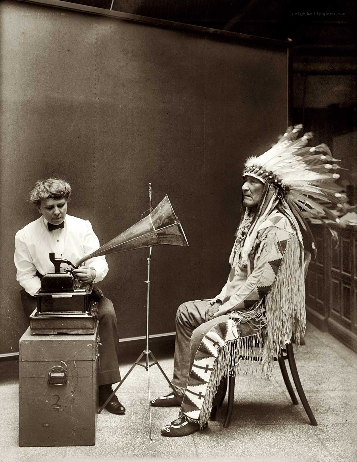 Native American man with phonograph
