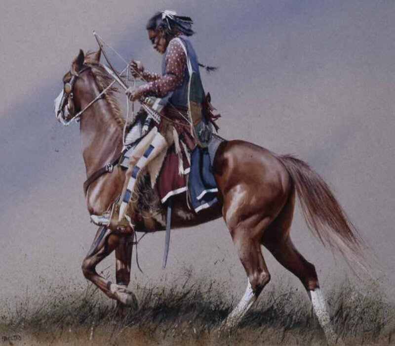 Native American on horseback with bow