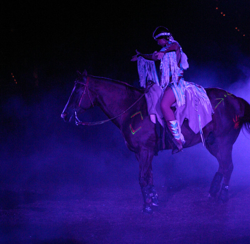 Native American performer on horse