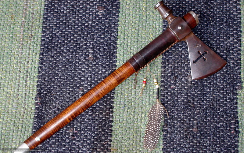 Native American tomahawk with feather