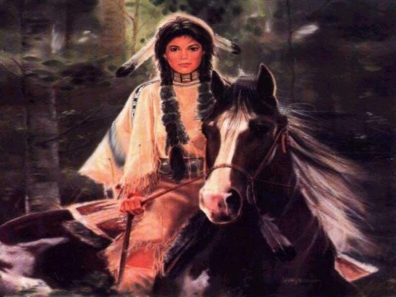 Native American woman on horseback