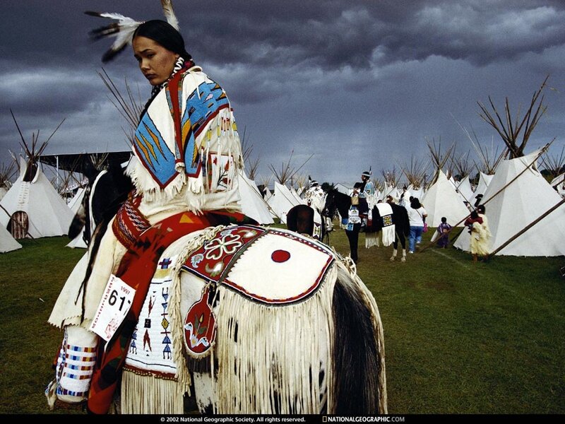 Native American woman on horseback