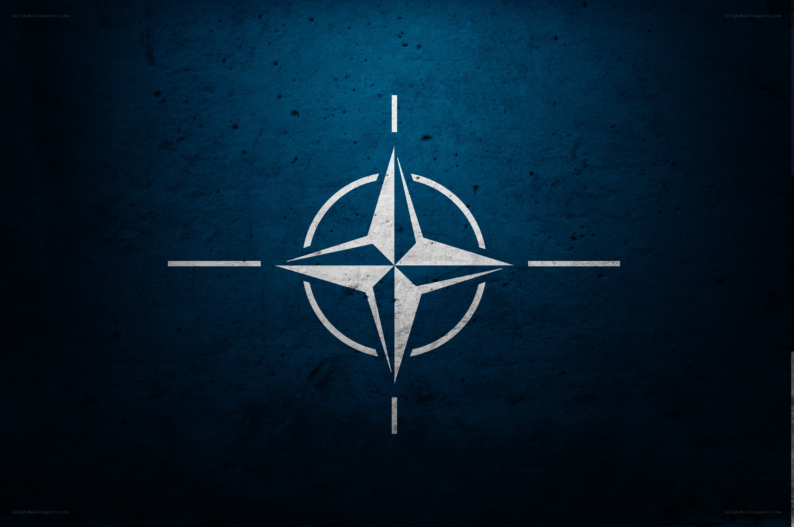 NATO symbol on blue background