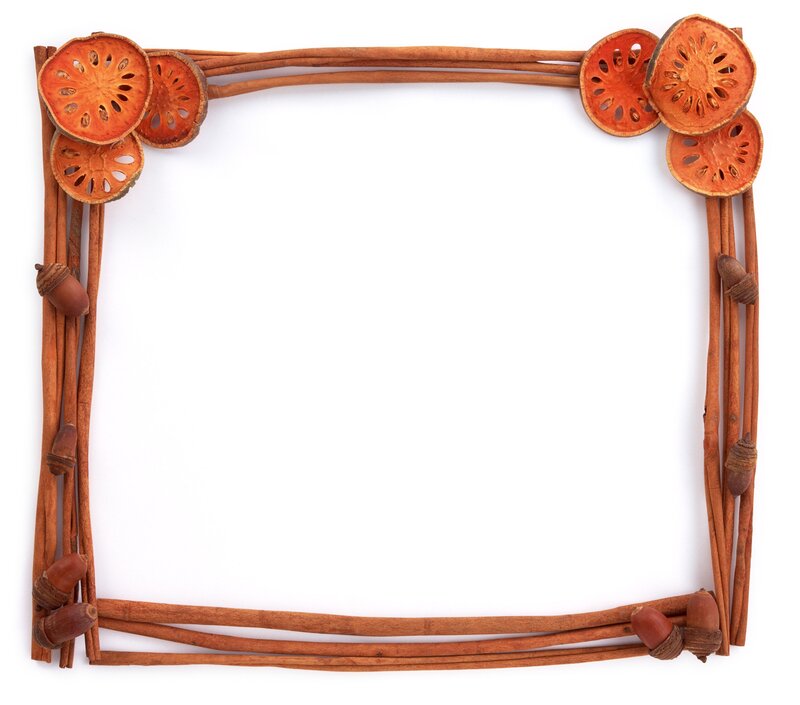 natural frame with cinnamon and acorns