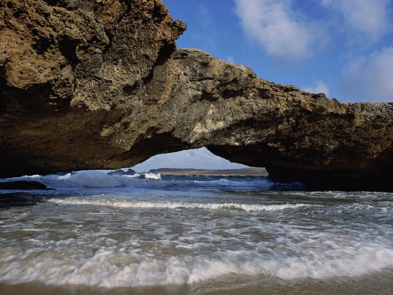 Natural Rock Arch at Beach — Blue, Dramatic, Afternoon