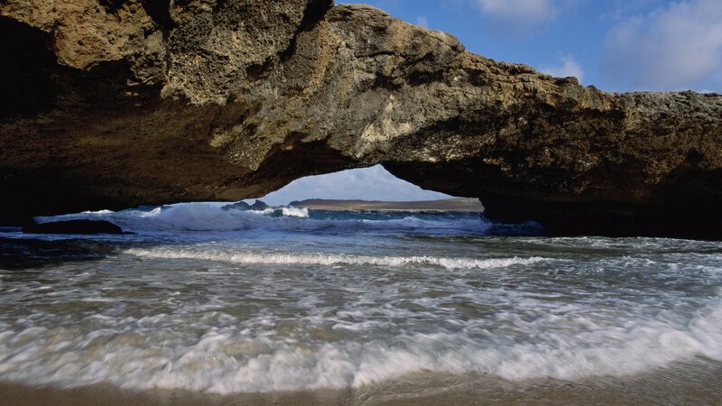 Natural Rock Arch at Beach — Blue, Dramatic