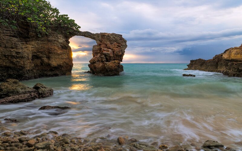 Natural Rock Arch at Beach — Blue, Serene, Sunset