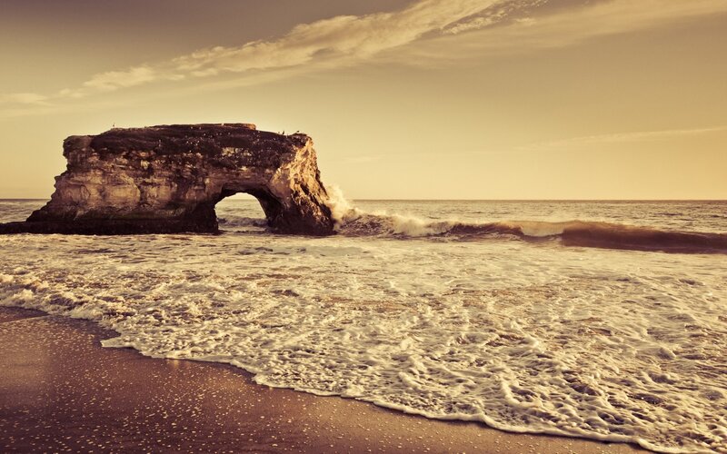 Natural Rock Arch at Beach — Brown, Serene, Sunset
