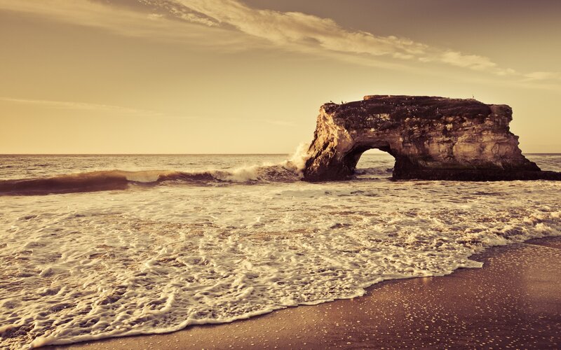 Natural Rock Arch at Beach — Brown, Serene