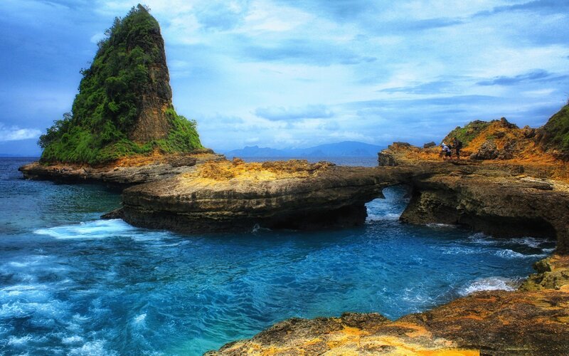 Natural rock arch at coastal site