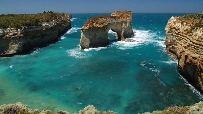 Natural rock arch at Loch Ard Gorge