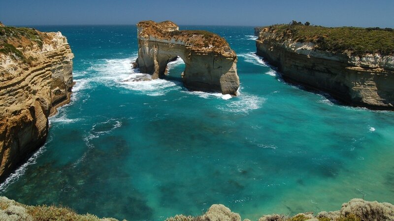Natural rock arch at Loch Ard Gorge