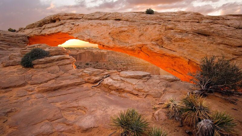 natural rock arch at sunset