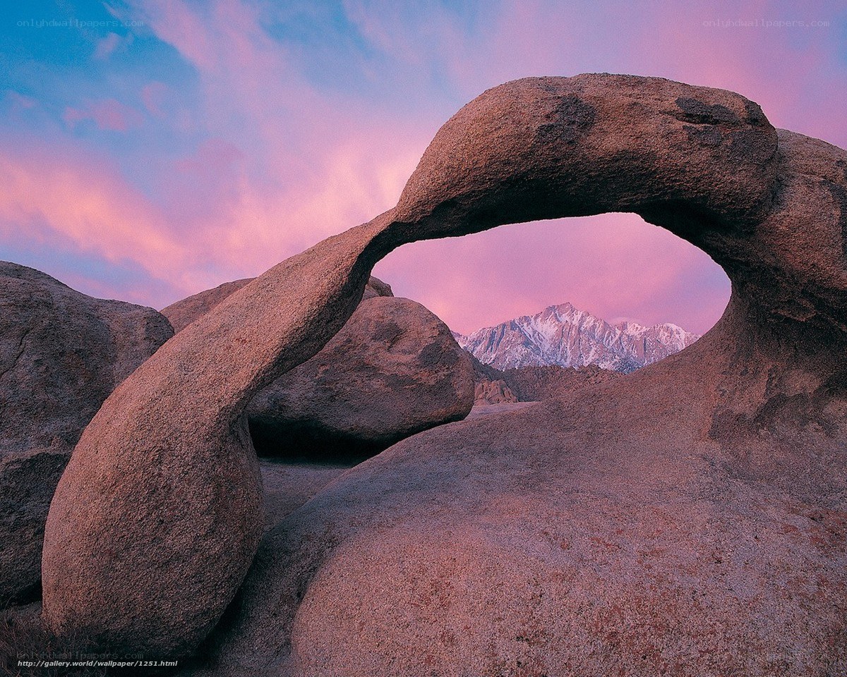 Natural rock arch at sunset