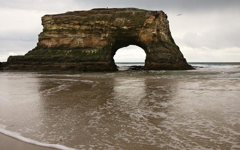 Natural rock arch at the beach