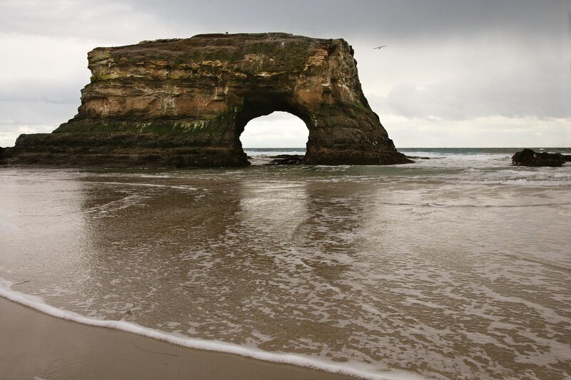 Natural rock arch at the beach