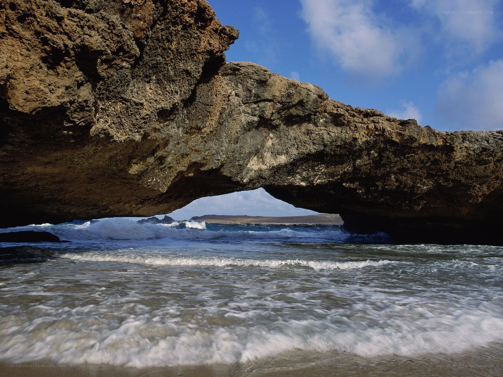 Natural rock arch at the beach