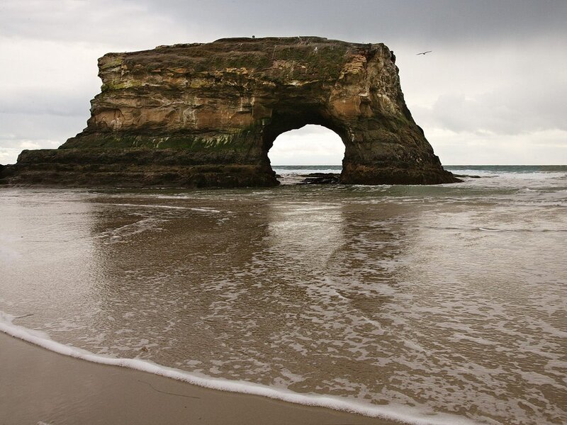 Natural rock arch at the beach