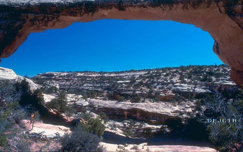 Natural Rock Arch — Blue, Serene, Afternoon, Photograph, Desert Landscape