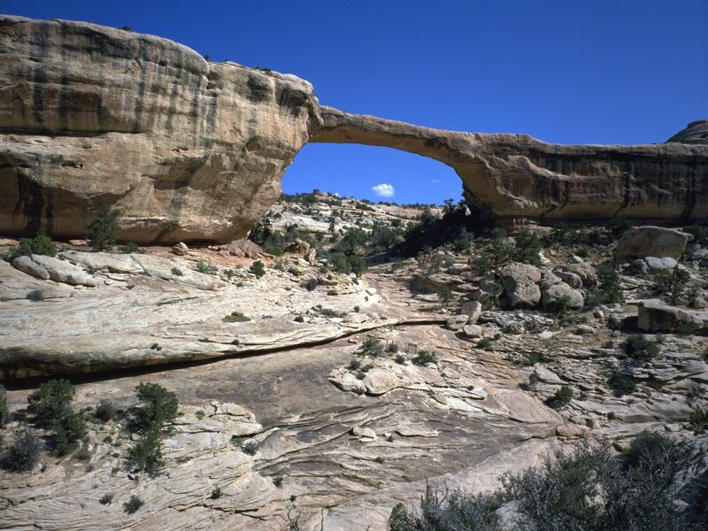Natural Rock Arch — Blue, Serene, Afternoon, Photograph, Sky, Desert