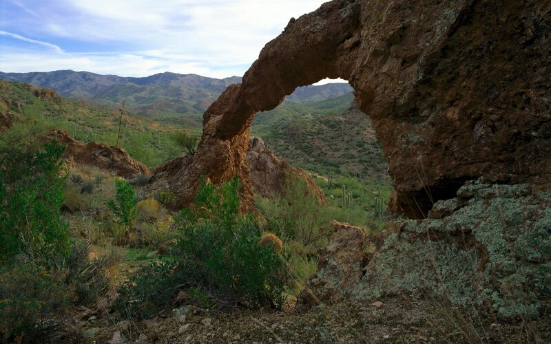 Natural Rock Arch — Brown, Serene, Afternoon, Photograph, Mountains, Cacti