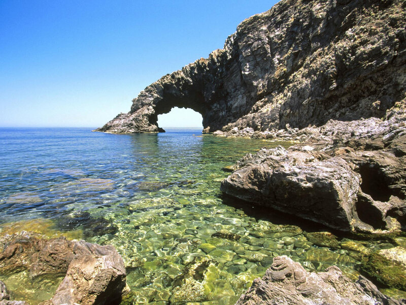Natural rock arch by the sea