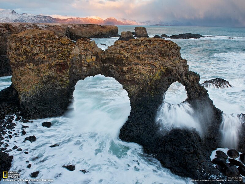 Natural rock arch by the sea