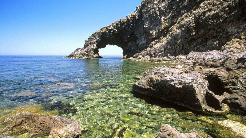 Natural rock arch by the sea