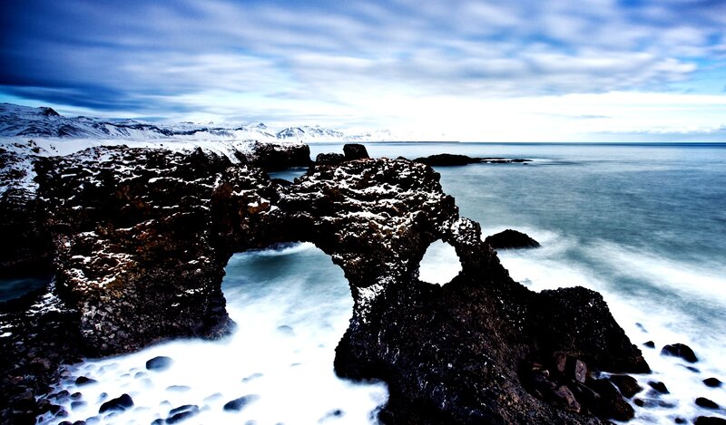 Natural rock arch by the sea