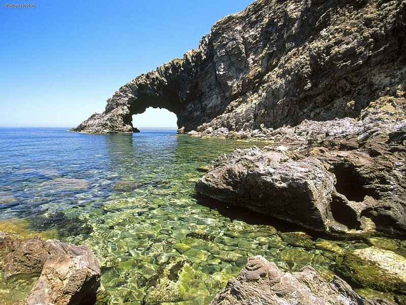 Natural rock arch by the sea